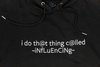 Extreme close up of front embroidery detail of i do that thing called influencing black hoodie